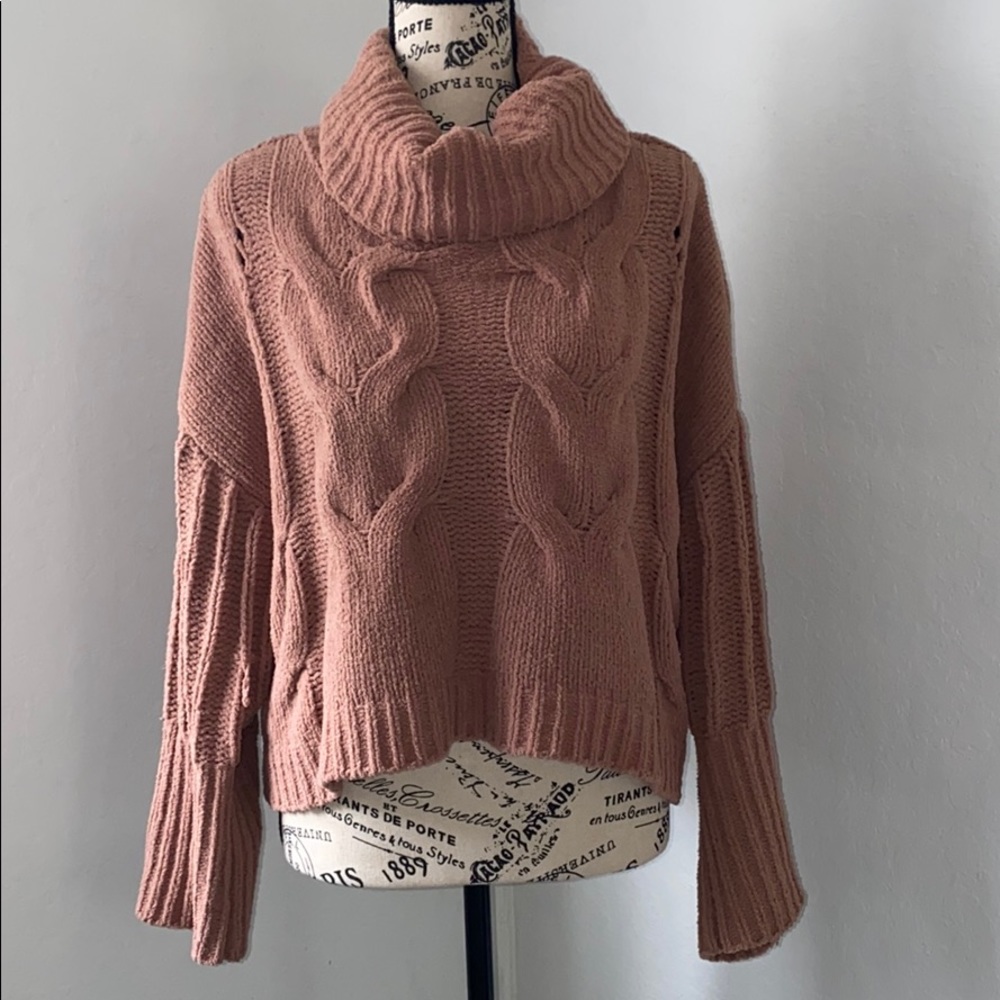 Maybe pink turtle neck sweater.